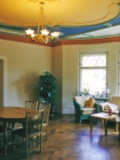 Gemeinschafts- und Wohnzimmer im Hospiz Villa Auguste, Leipzig Gemeinschafts- und Wohnzimmer im Hospiz Villa Auguste, Leipzig